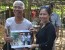 Mr. Trung is thrilled to receive an image-gift from the representative of Save the Children in Vietnam
